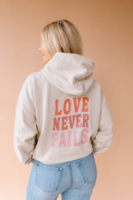 Load image into Gallery viewer, Love Never Fails Pullover